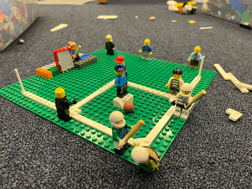 A creative LEGO baseball scene built by students